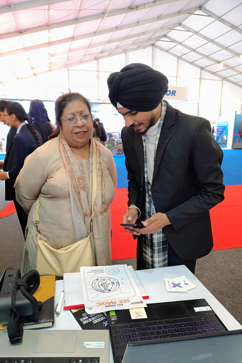 Teacher using interactive whiteboard with AR overlay demonstrating 3D science concepts to engaged classroom students